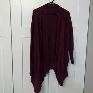 Maurice’s cardigan. Half sleeve, long in the back shorter in the front.